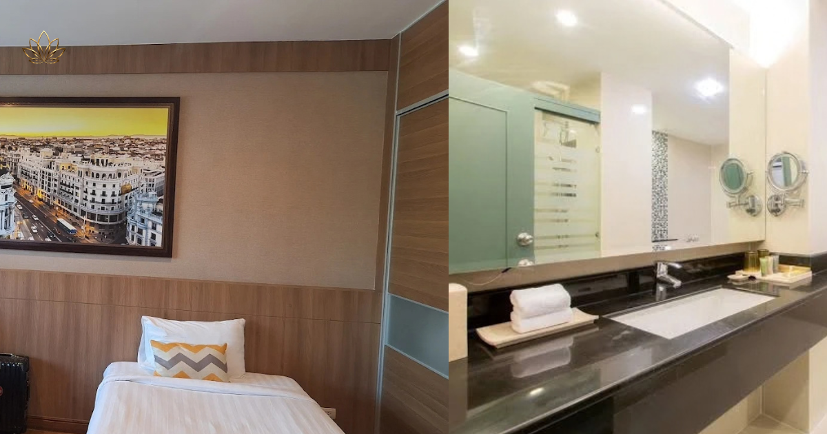 A guest bedroom with bedside artwork, and the bathroom vanity with folded towels