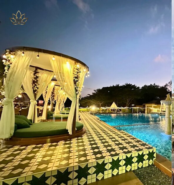 A lit poolside cabana at dusk beside the residence pool